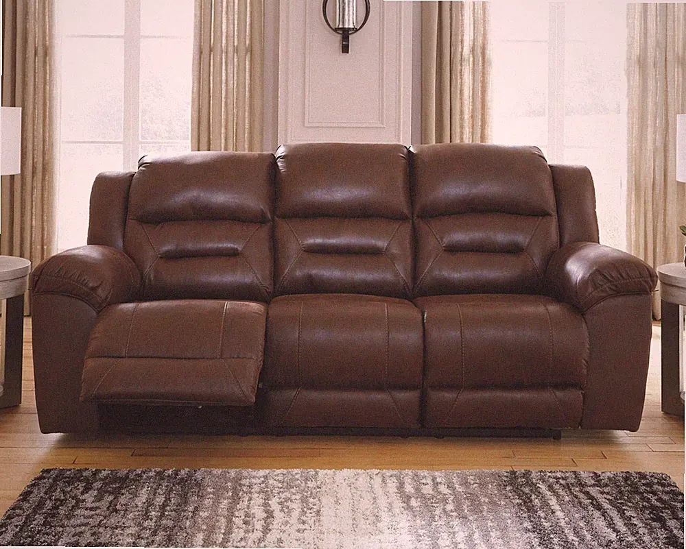 Signature Design by Ashley Stoneland Reclining Loveseat with Console in Fossil